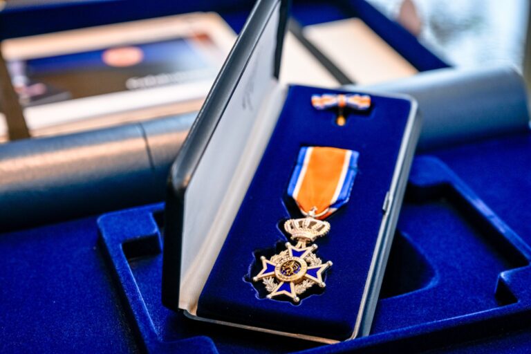 Twee leden van HGC Overbrug koninklijk onderscheiden